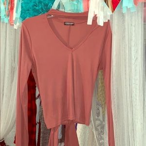 It’s a Fashion nova crop top, It also ties in back